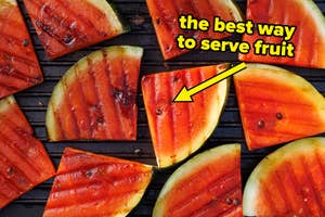Grilled watermelon slices on a grill with the text "the best way to serve fruit" pointing to a slice