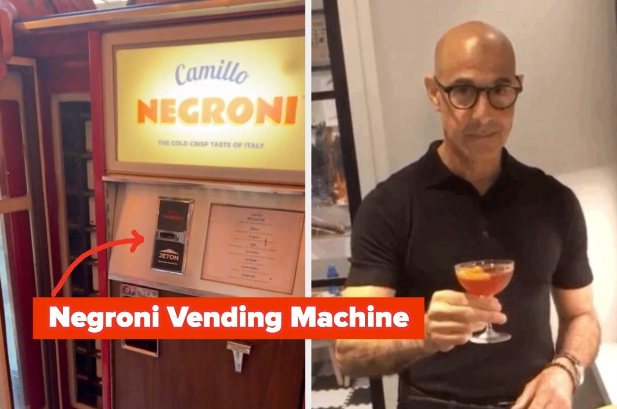 Man holding a Negroni cocktail next to a Negroni vending machine with a playful arrow sign pointing at the machine
