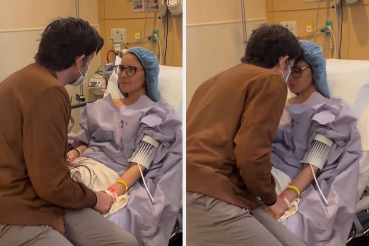 Split image of John Mulaney and Olivia Munn holding hands on a hospital bed, with Olivia in hospital attire