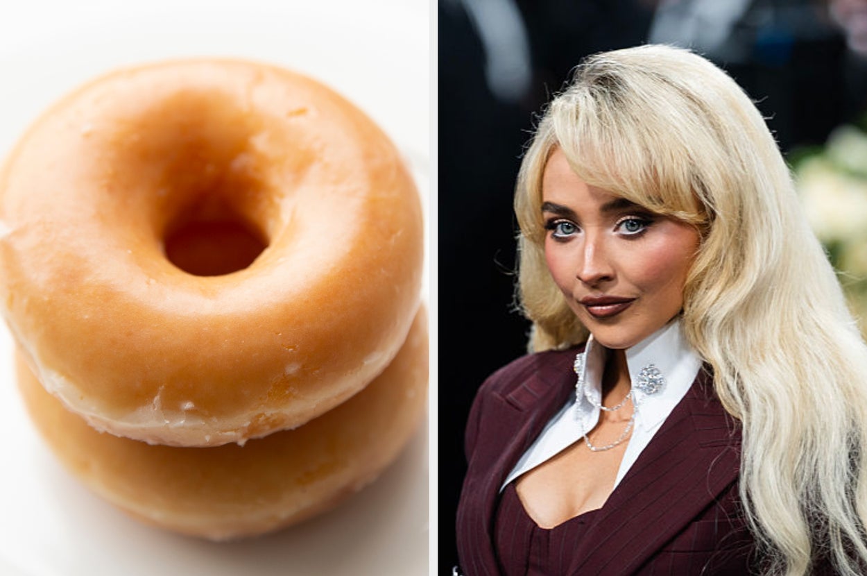 Two glazed donuts beside a person with long blonde hair, wearing a formal jacket with a white collar