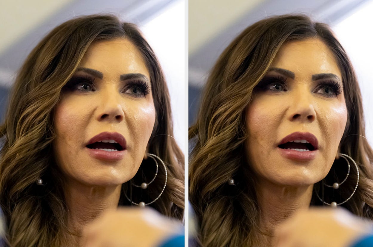 noem wearing large hoop earrings speaks. The setting appears to be an interview or press event