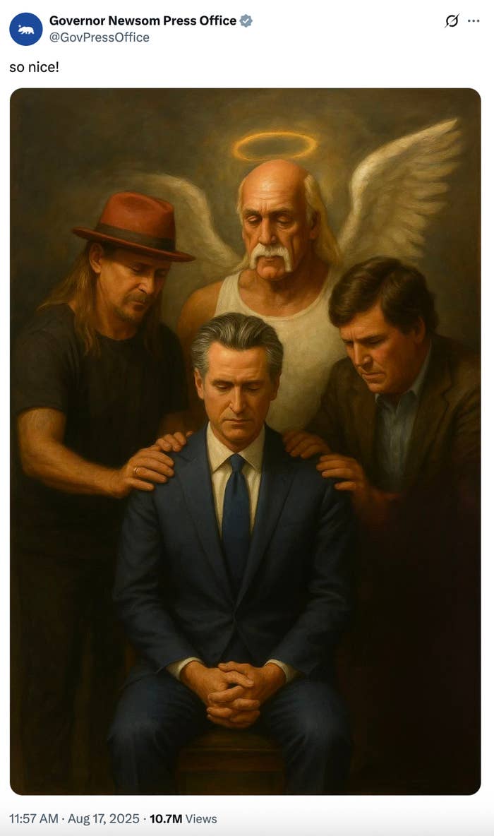 Four men are in a painting, with one wearing a blue suit seated, and the others standing around him in a supportive pose. One has angel wings