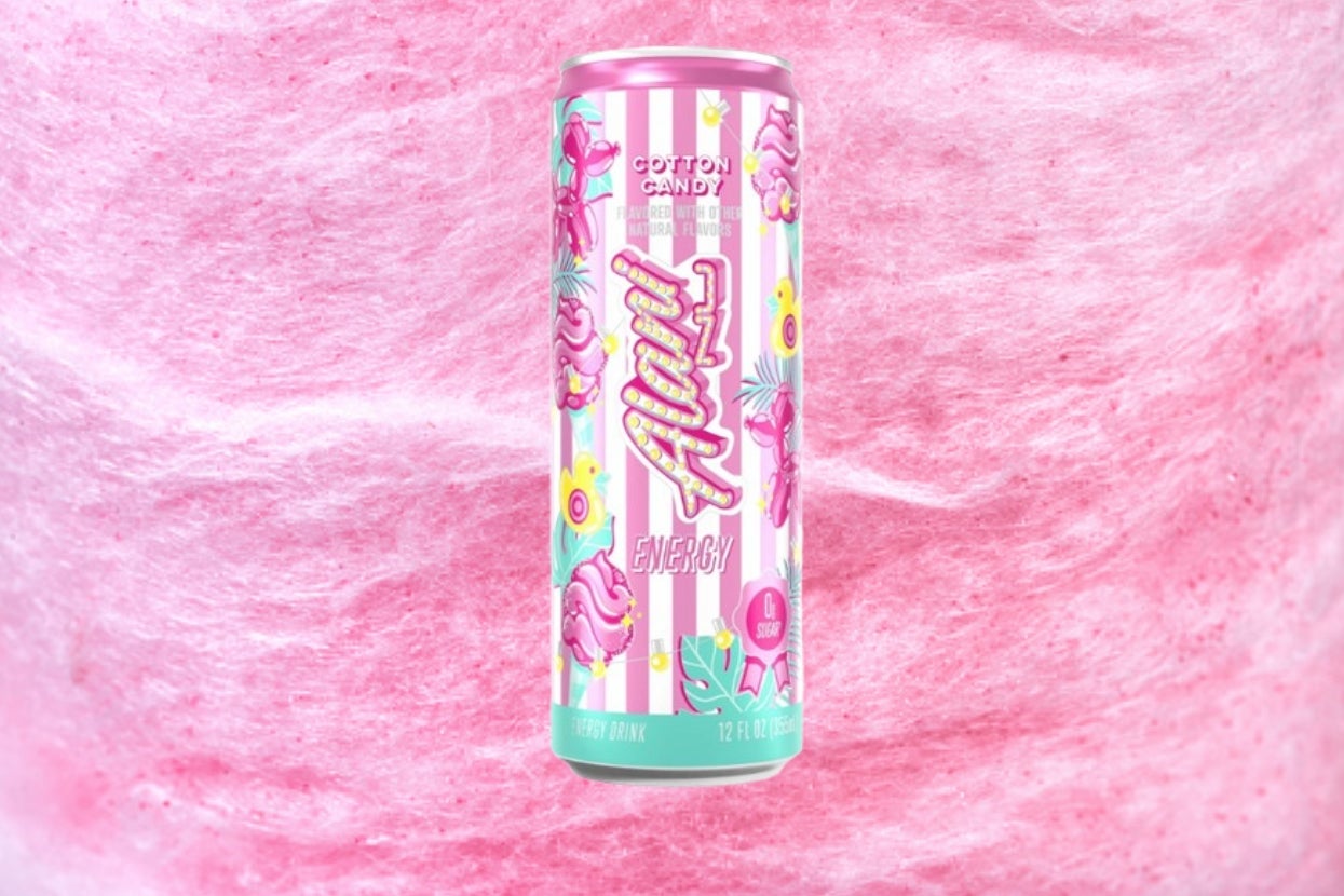Energy drink can with pink flamingo and palm leaf design, labeled "Cotton Candy" and "Energy," set against a fluffy pink background