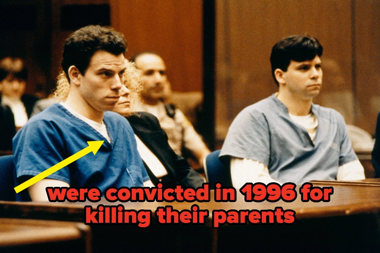 Erik and Lyle Menendez in prison uniforms sit in a courtroom