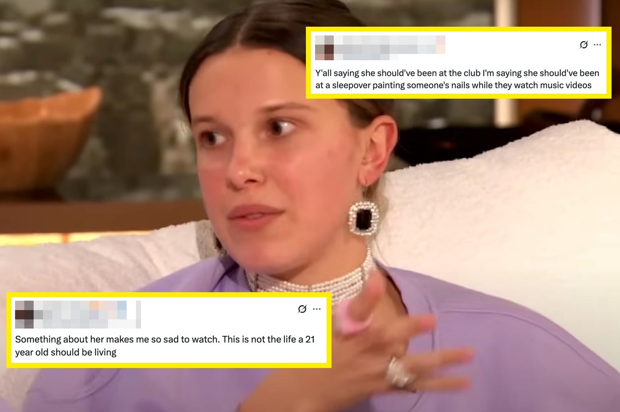 Person wearing pearl choker, large earrings, and light top gestures during an interview