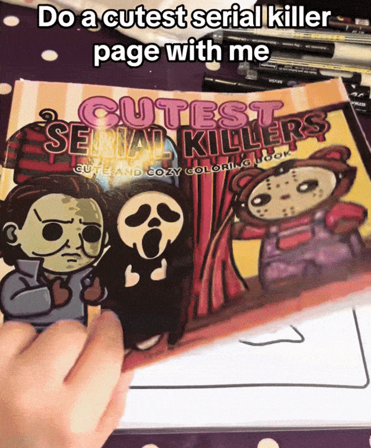 Person flipping through a coloring book titled 