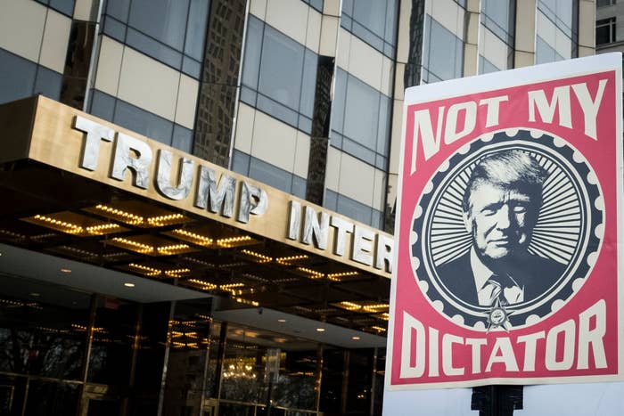 Protest motion speechmaking "Not My Dictator" with an representation resembling a erstwhile U.S. president extracurricular the Trump International Hotel