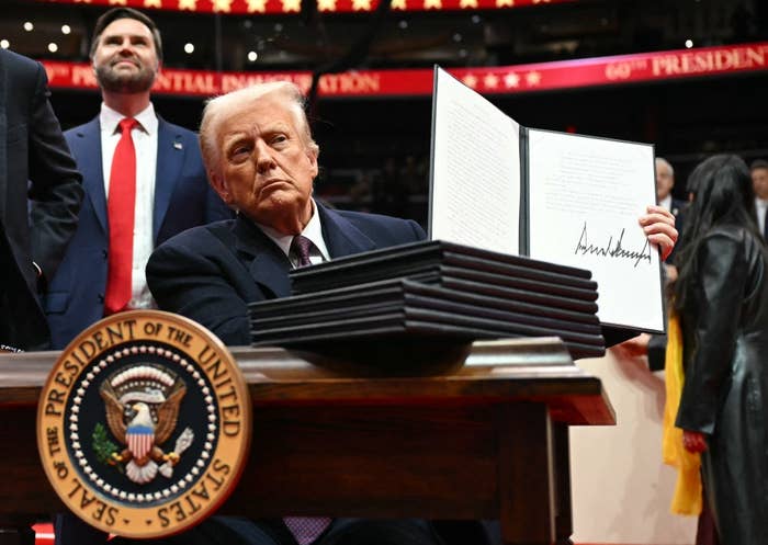 Donald Trump holds an enforcement bid helium conscionable signed during the inaugural parade wrong Capital One Arena successful DC connected January 20, 2025