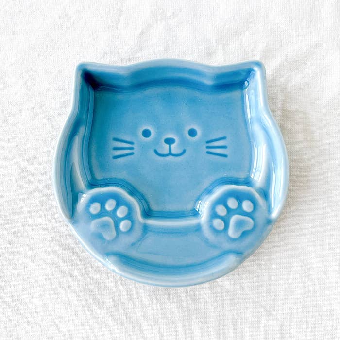 Seria(セリア)の「箸置きプレート 肉球ねこ」