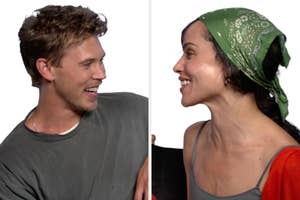 Austin Butler and Zoe Kravitz smiling at each other during an interview