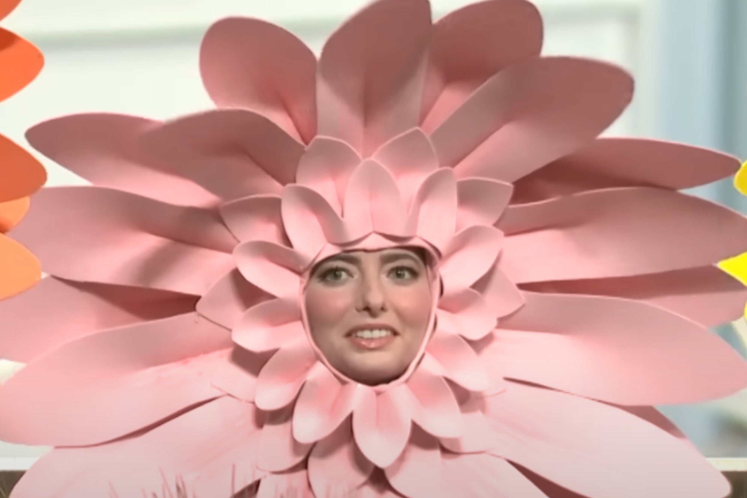 Sarah Sherman in a flower costume in an SNL sketch