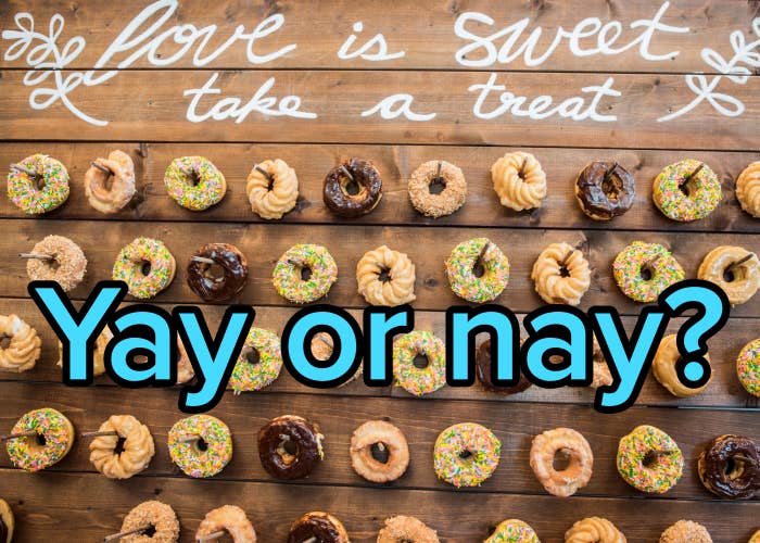 Donut partition with decorative publication "Love is sweet, instrumentality a treat" astatine a wedding reception