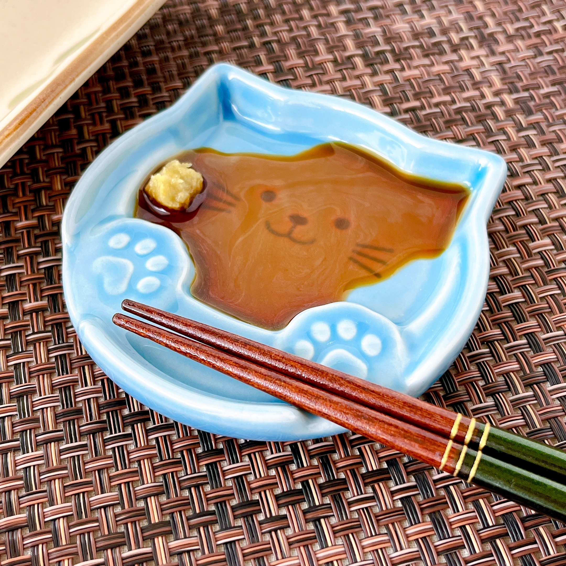 Seria(セリア)の「箸置きプレート 肉球ねこ」