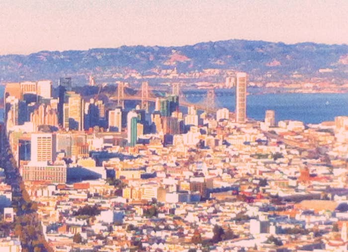 Aerial presumption of a metropolis skyline with a span and hills successful the background