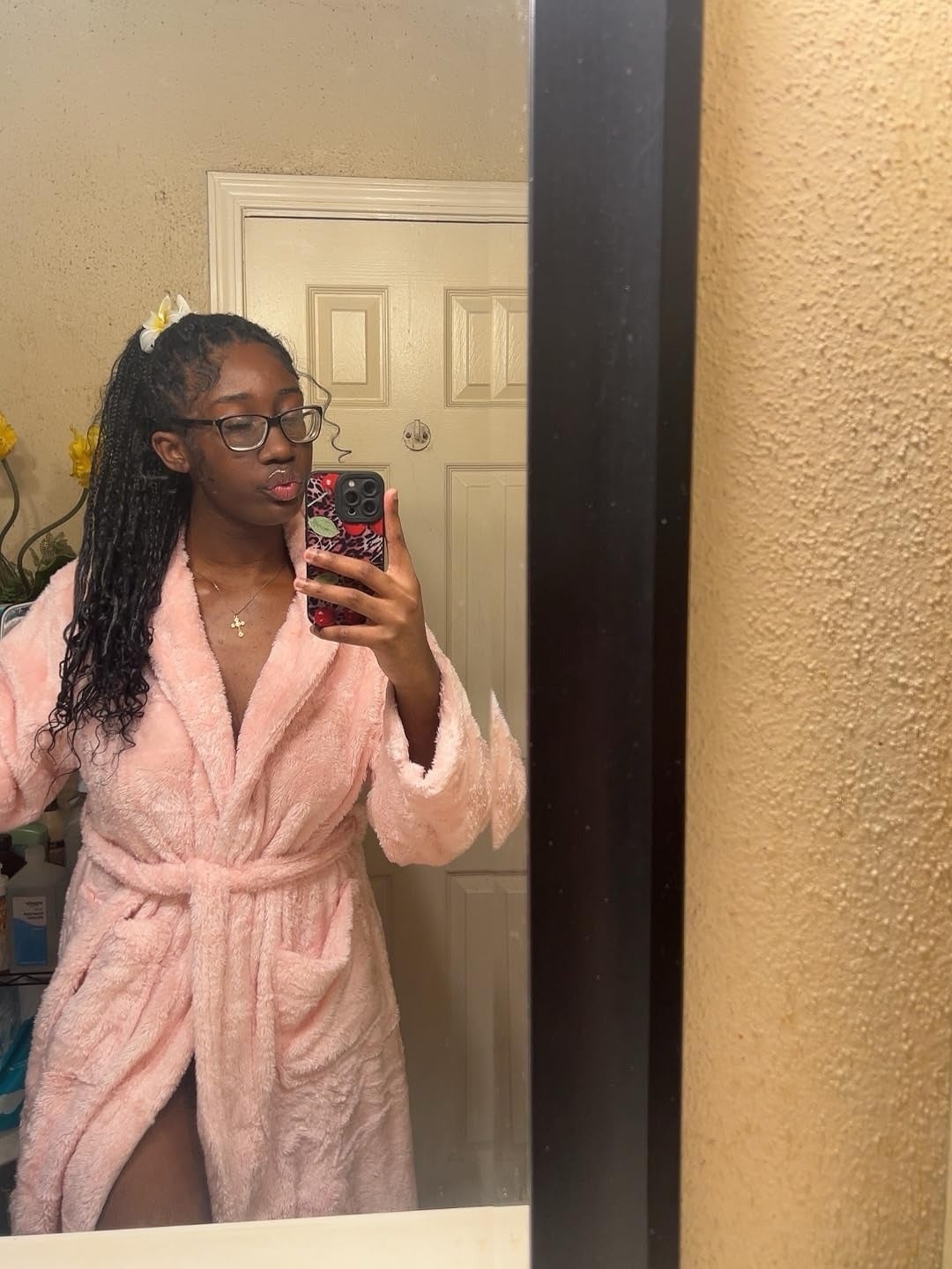 Person successful  a bath  reflector  selfie wearing a fluffy bathrobe and glasses, posing with hairsbreadth  tied back