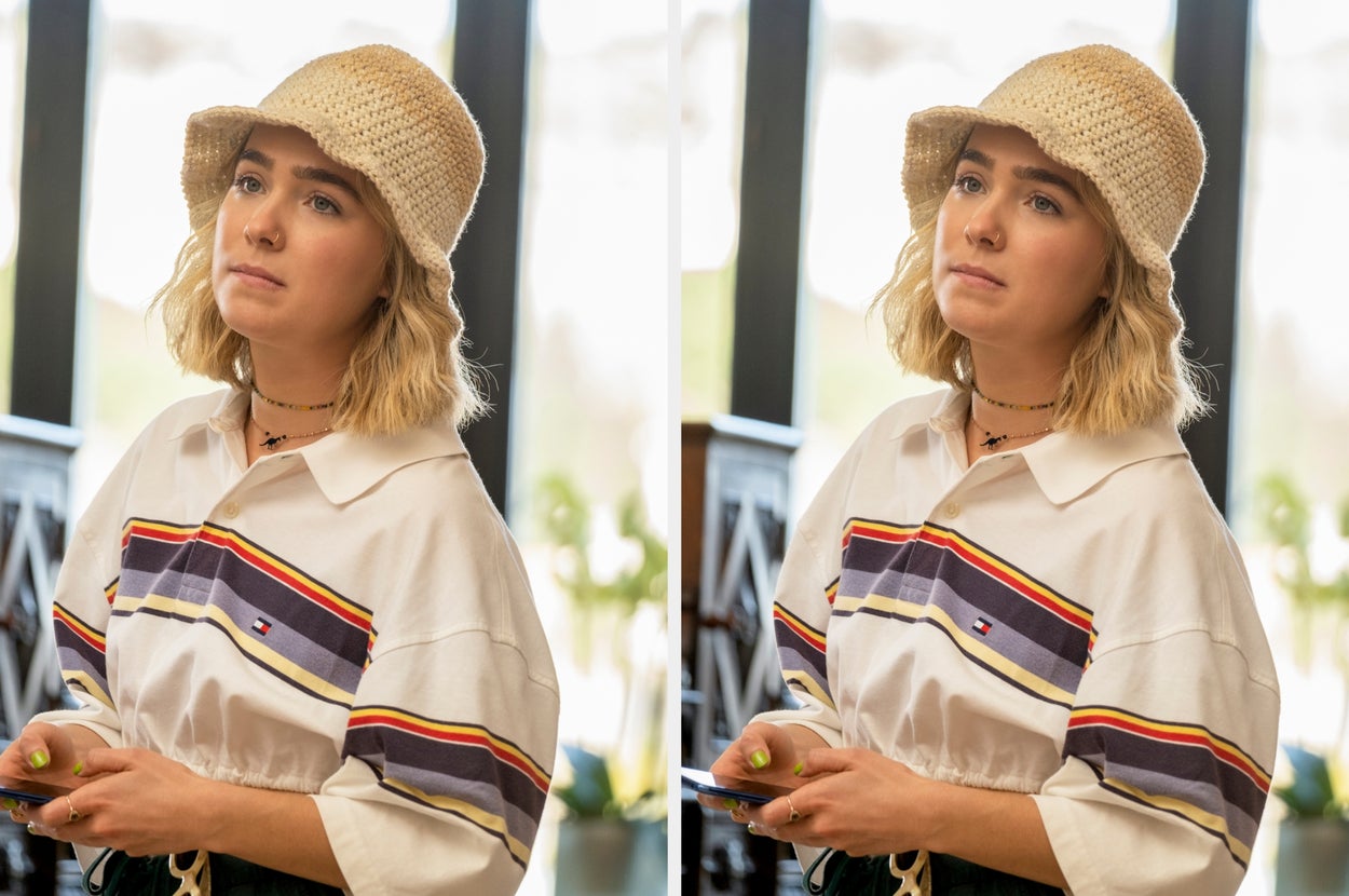 Person wearing a crochet hat and striped shirt, holding items, appears thoughtful indoors