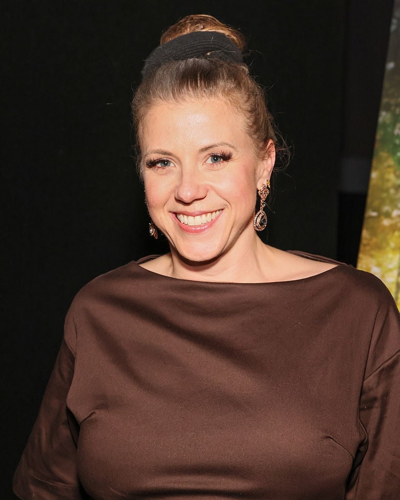 Sweetin smiling at an event