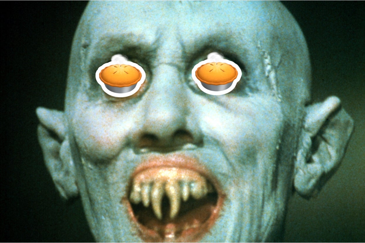 Horror character from "Salem's Lot" with fanged mouth has cartoon pumpkin pies covering their eyes. Faces forward with a menacing expression
