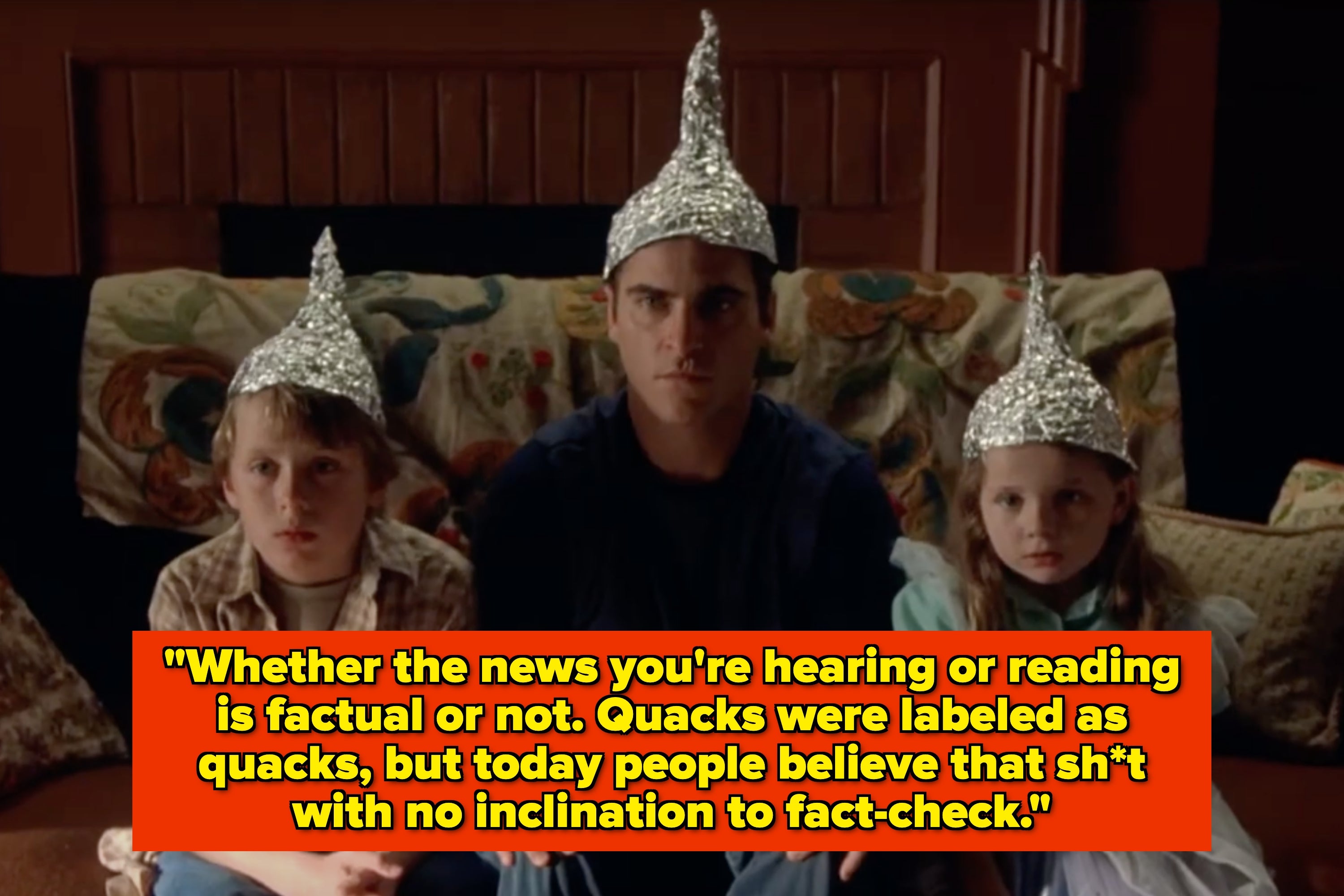 Three people wearing foil hats sit on a sofa. Caption discusses belief in news without fact-checking