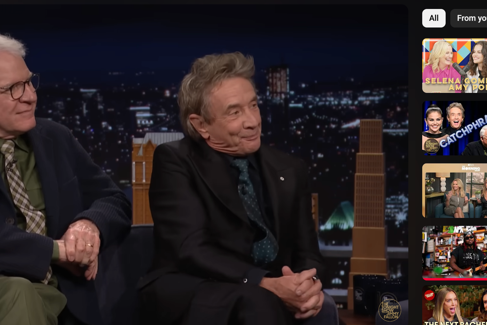 Steve and Martin sitting on a talk show set