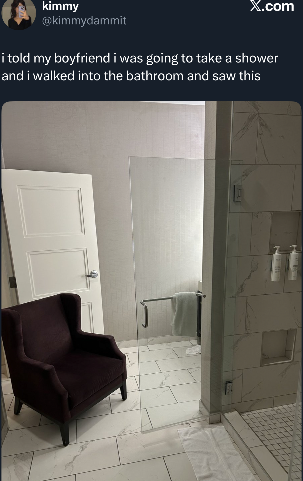 Bathroom with a seat  positioned successful  beforehand   of the unfastened  shower, suggesting a astonishing   oregon  humorous scenario