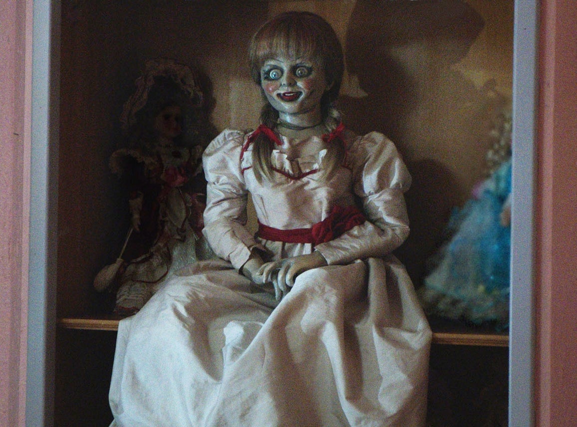A doll sitting on a shelf in "Annabelle."