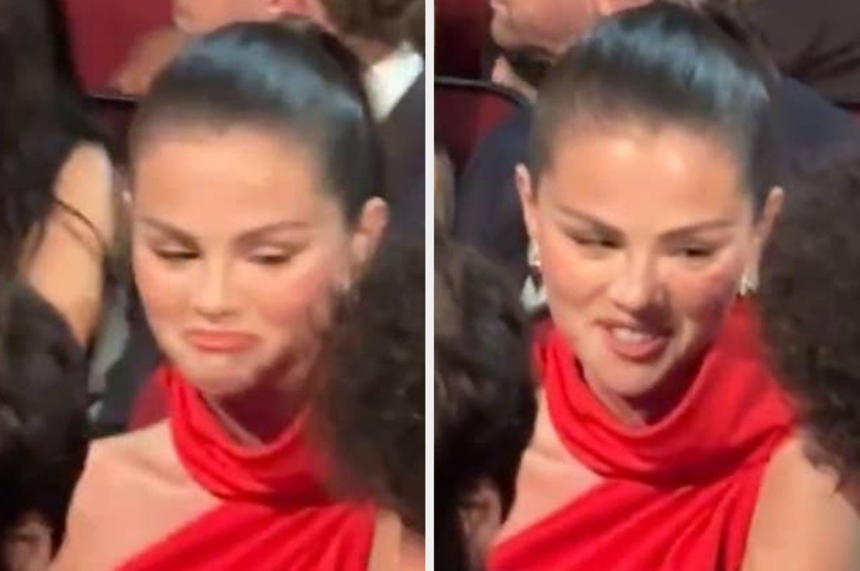 Celebrity in an elegant draped gown, conversing and reacting expressively at a public event