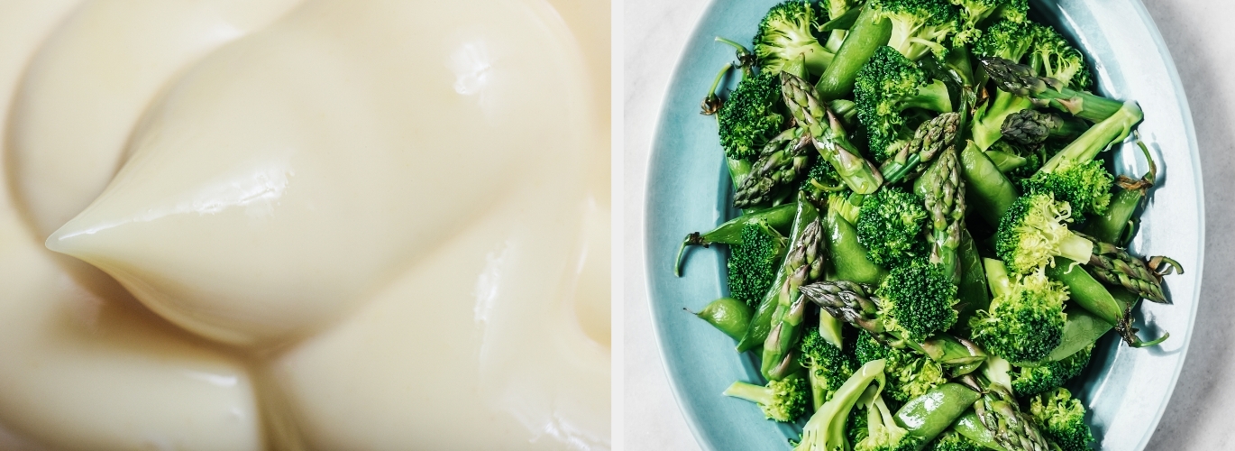 Close-up of mayonnaise and a bowl of steamed greens with broccoli and asparagus