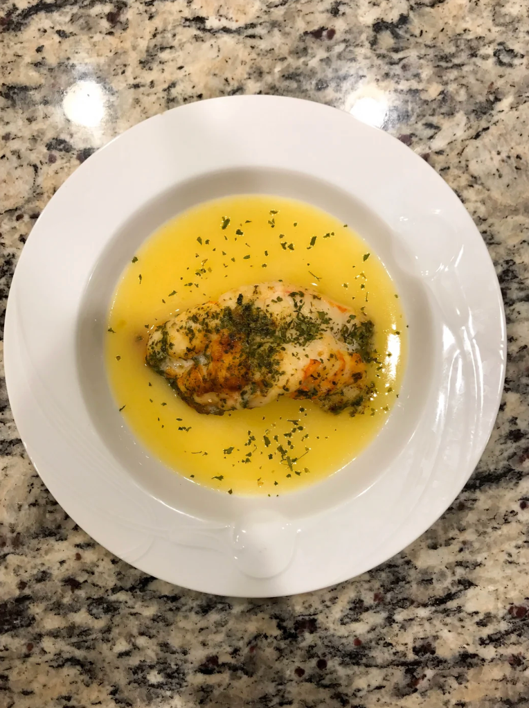 A Reddit post showing a dish of lobster tail with Beurre Monté, cooked at 140°F for 25 minutes, presented on a plate with garnish