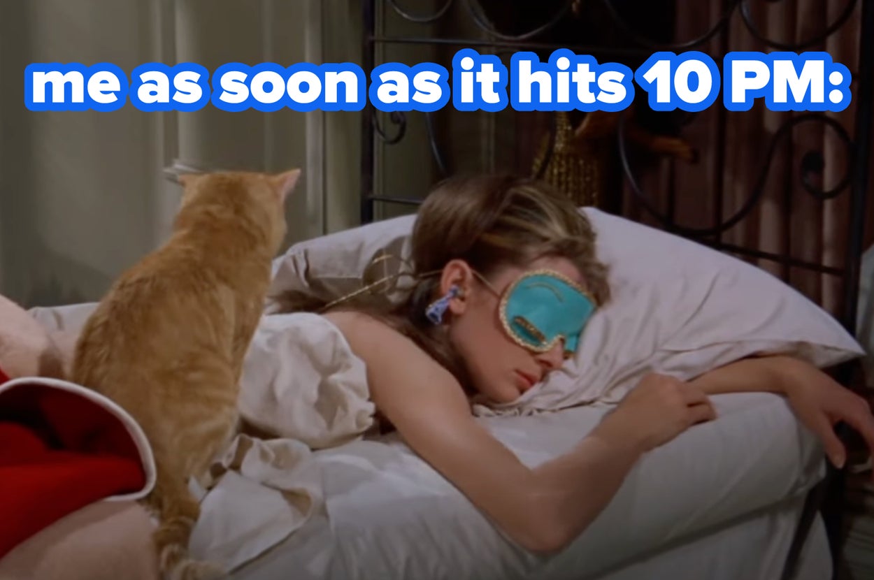 Person sleeping with an eye mask, accompanied by a cat. Text says: "me as soon as it hits 10 PM."