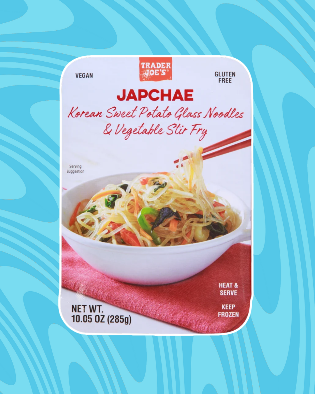 Image of Trader Joe&#x27;s Japchae packaging showing sweet potato glass noodles stir fry with vegetables. Text highlights it&#x27;s vegan and gluten-free