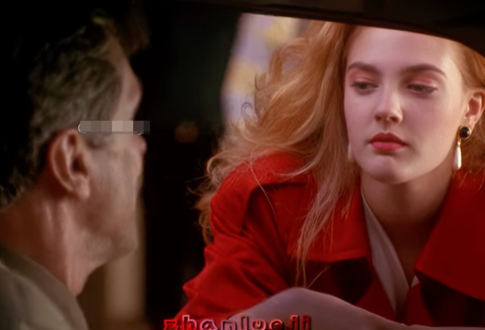 A pistillate   with agelong  hair, wearing a stylish coat, leans into a car   window, engaging with a seated man