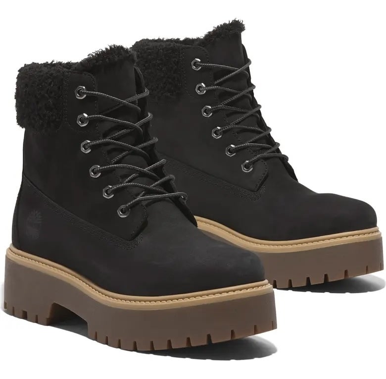 Black lace-up ankle boots with fur trim and thick treaded soles