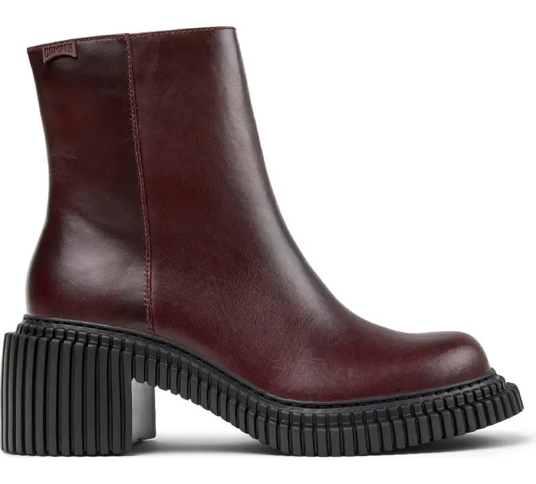 Chunky ankle boot with a thick ribbed sole and smooth leather finish, suitable for casual and edgy outfits