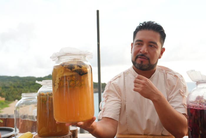 David holding a finished jar of tepache