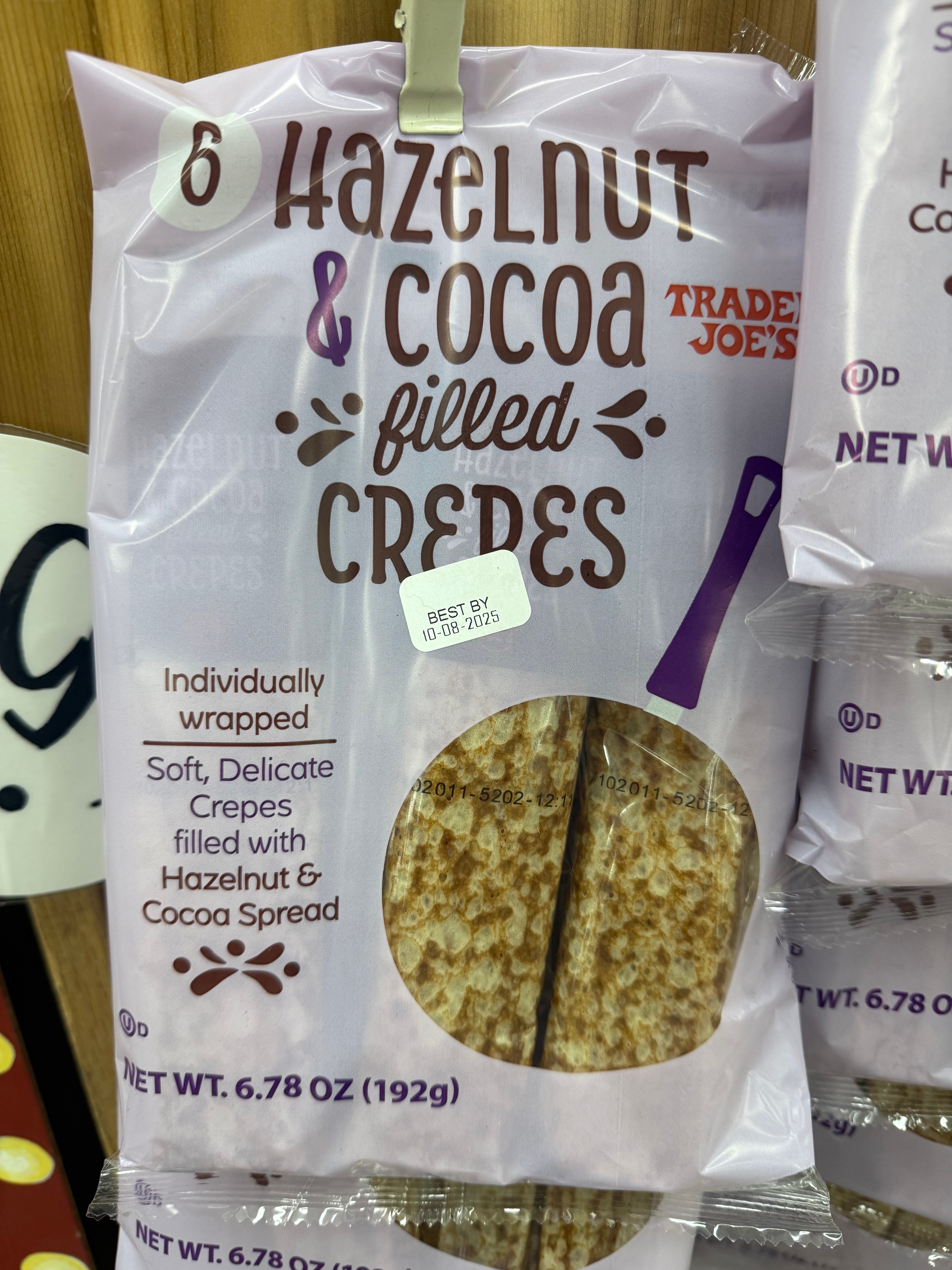 Package of Trader Joe's hazelnut and cocoa-filled crepes. Contains six individually wrapped crepes, best by 01-11-2025
