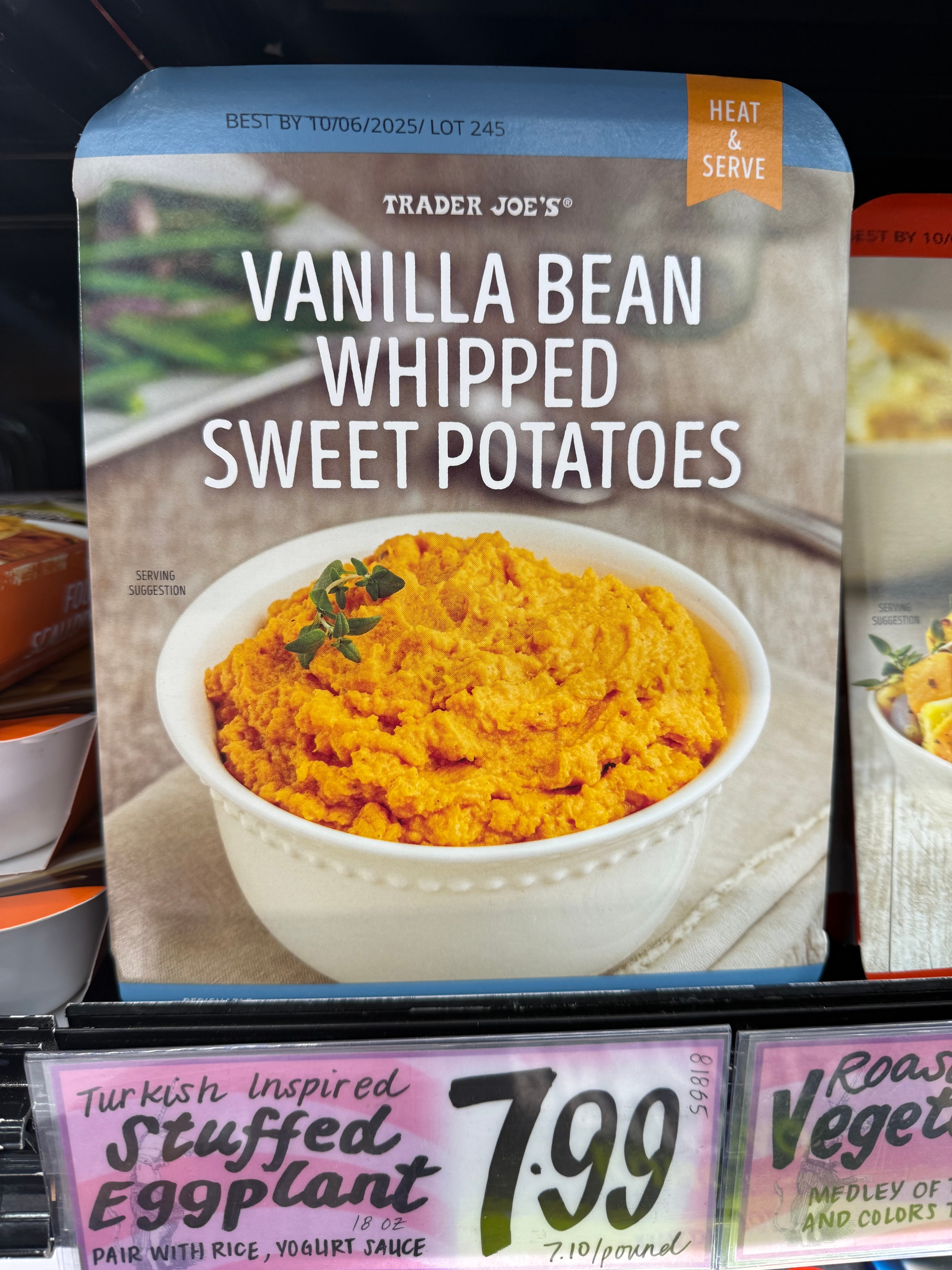 Trader Joe's packaged Vanilla Bean Whipped Sweet Potatoes, labeled "heat & serve," priced at $7.99