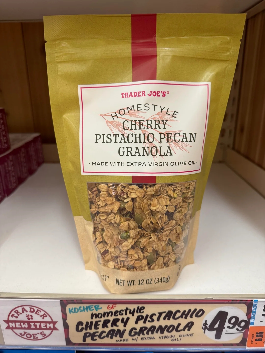 Trader Joe's Cherry Pistachio Pecan Granola package on a shelf, priced at $4.99