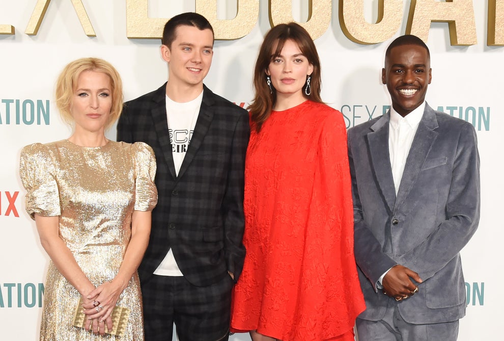 18 TV Shows That Had Some Of The Worst Endings Of All Time 14 Four people on a red carpet; one in a glittery outfit, another in a plaid suit, another in a red dress, and the last in a velvet suit