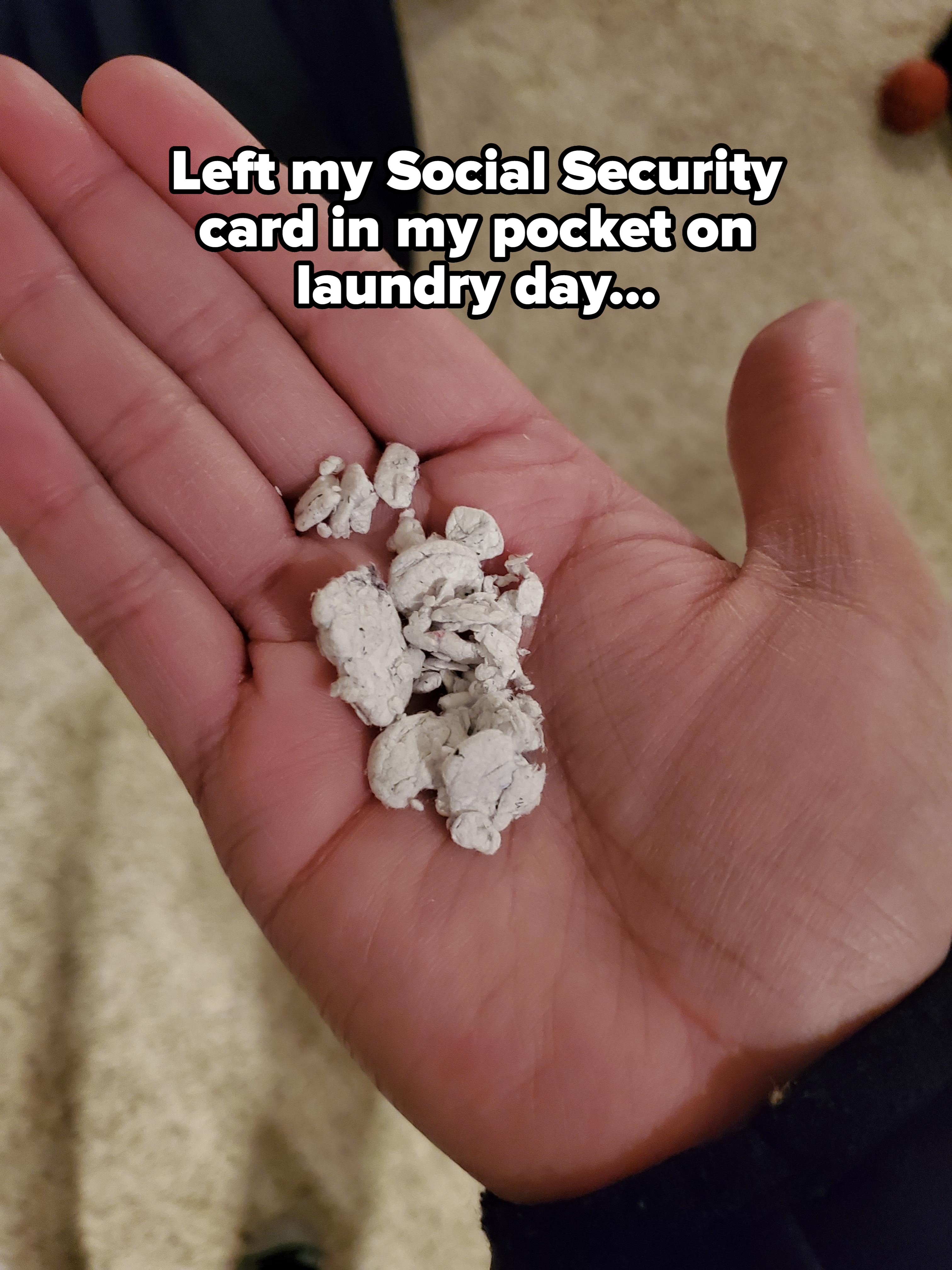 Bits of chewed gum rest in an open palm