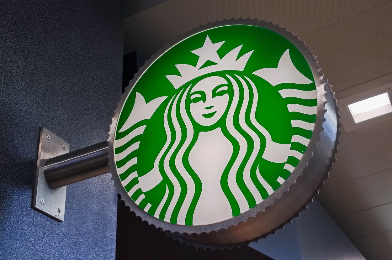 スターバックスコーヒーの看板(時事)