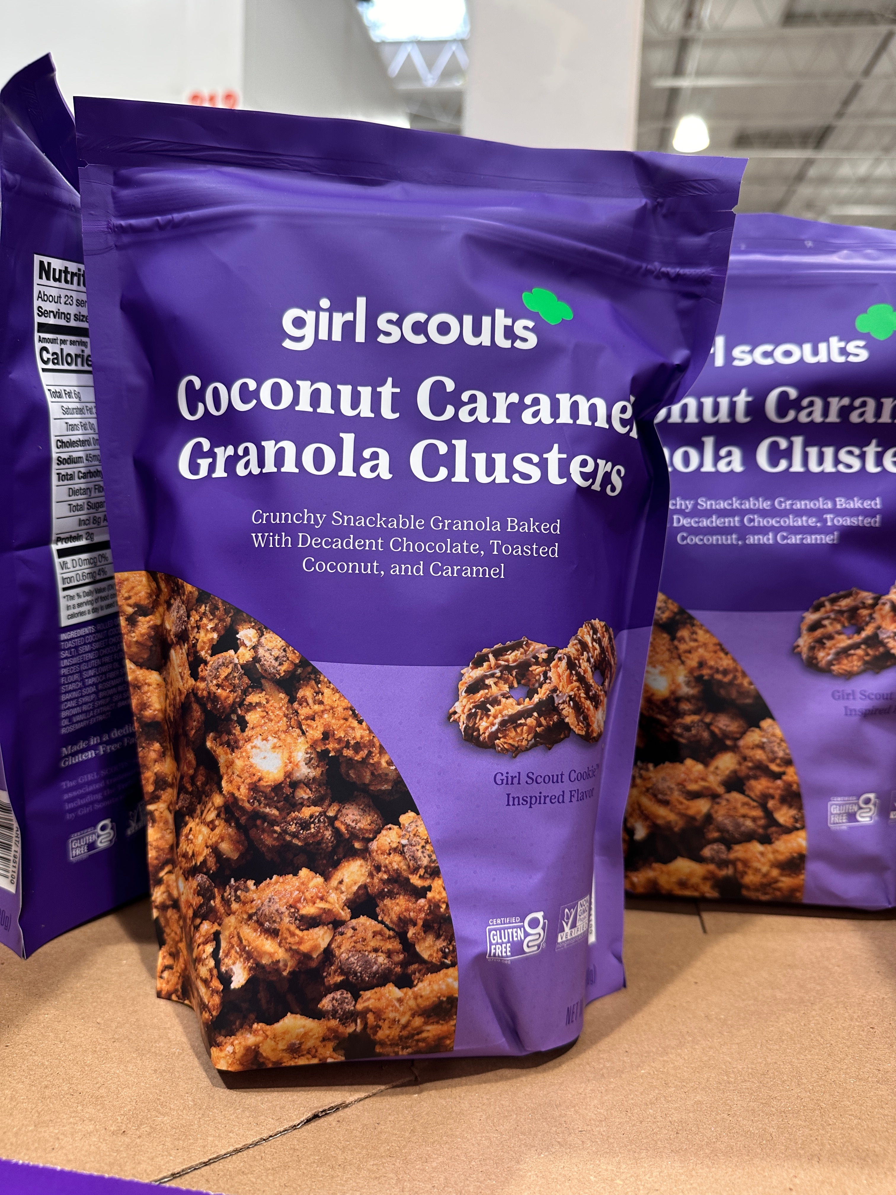 Bag of Girl Scouts Coconut Caramel Granola Clusters on display, featuring crunchy granola baked with toasted coconut and caramel