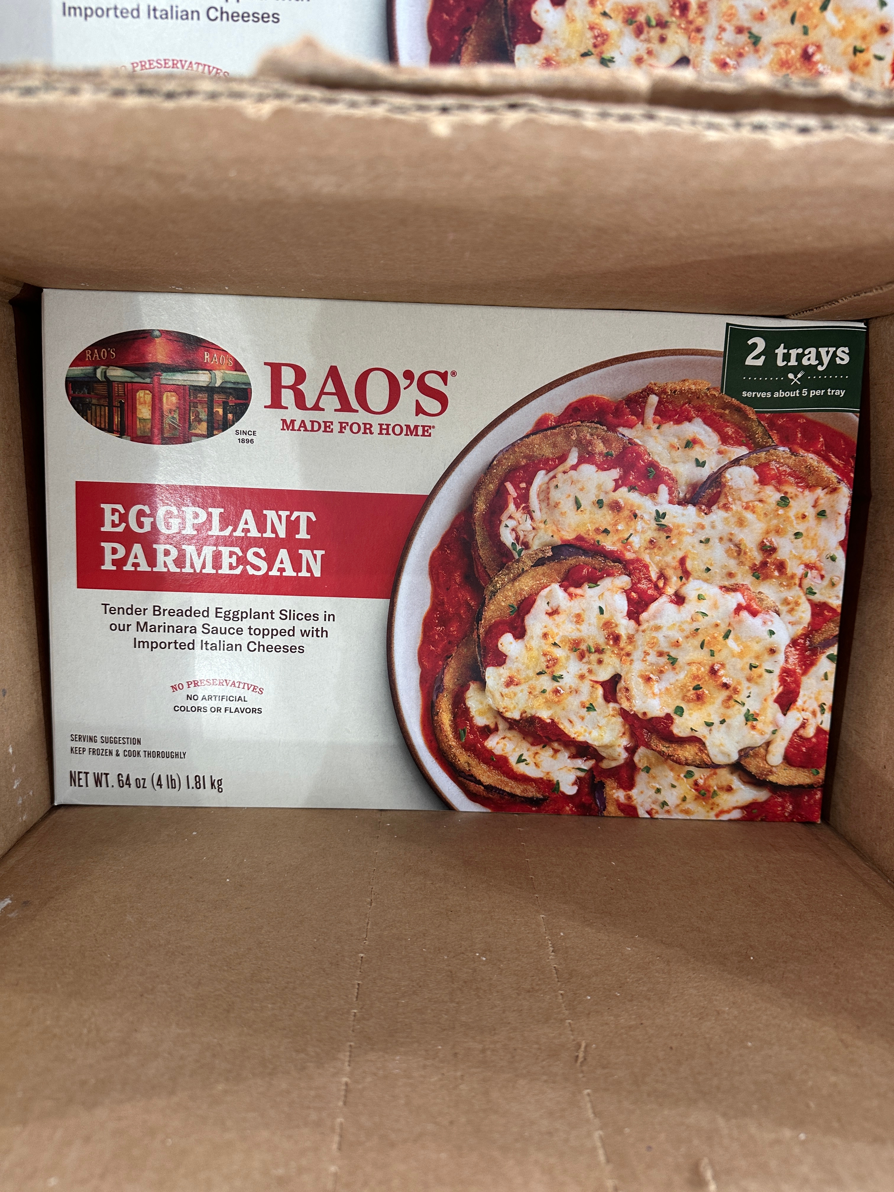Box of Rao's Eggplant Parmesan featuring breaded eggplant slices in marinara topped with Italian cheeses