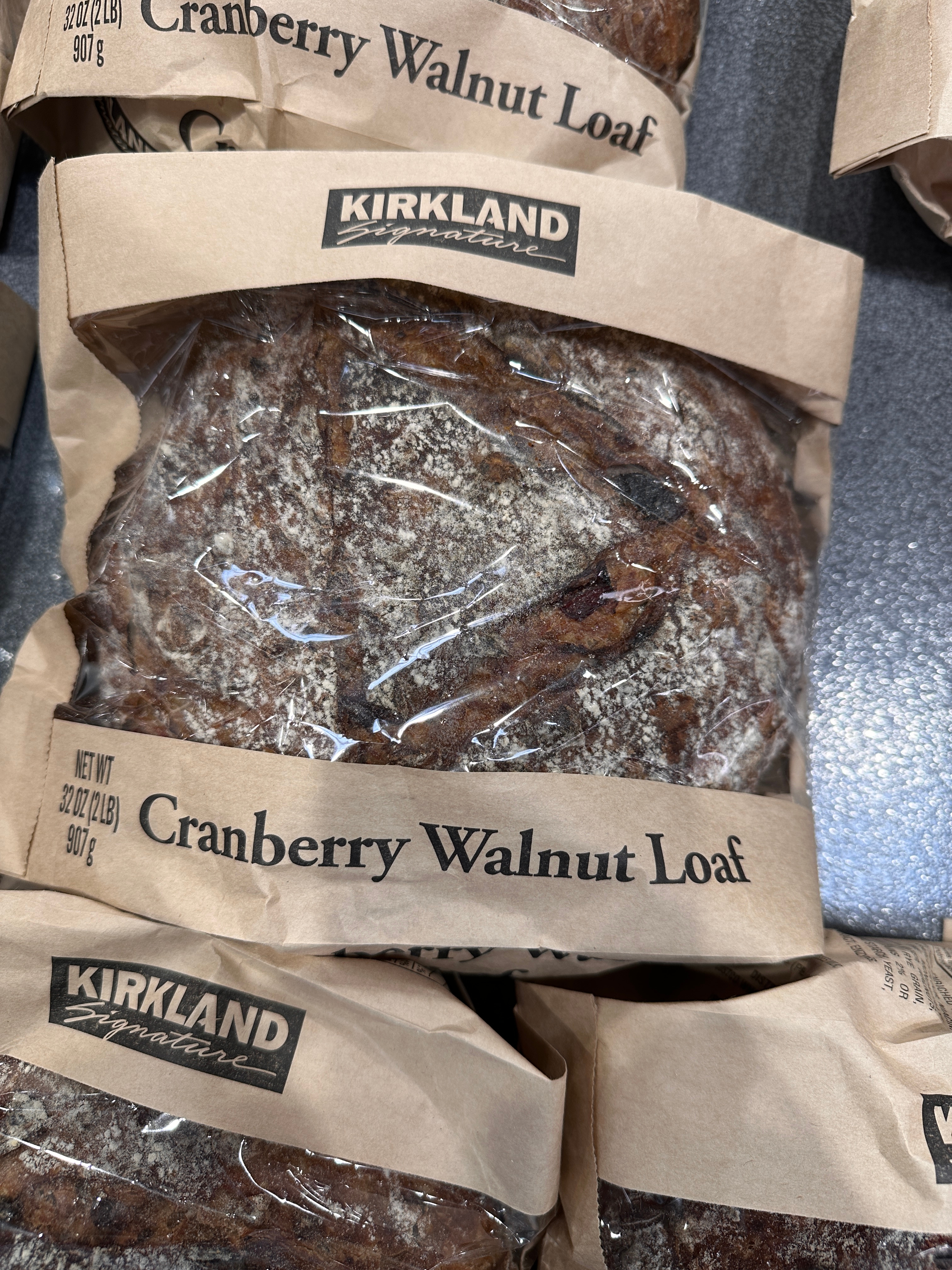 Bagged cranberry walnut loaf displaying Kirkland Signature label