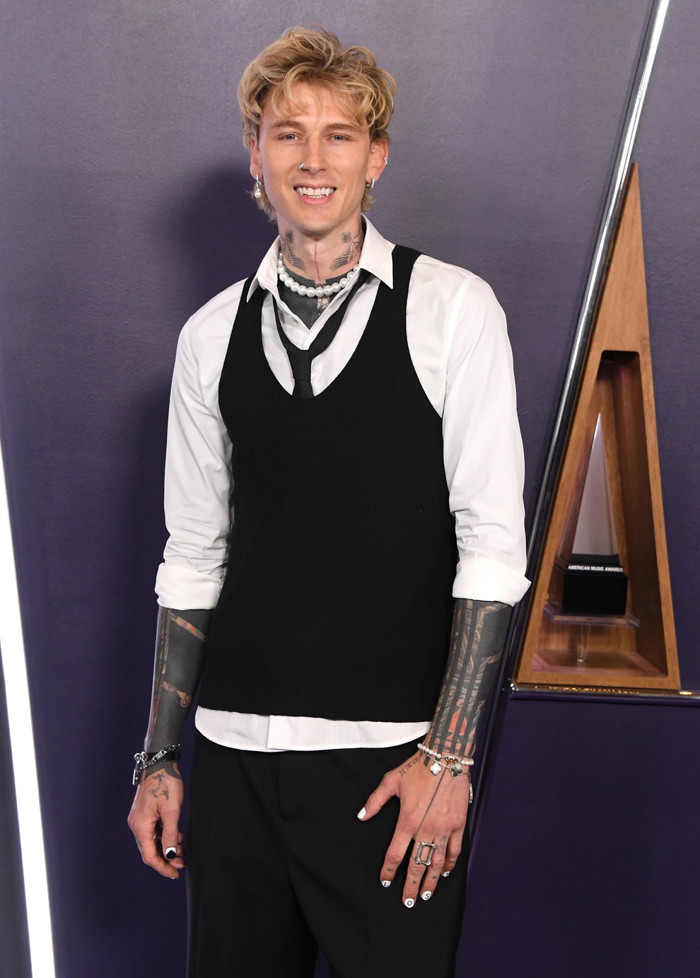 19 Celebs Who Welcomed Babies Super Young 33 Machine Gun Kelly on the red carpet.