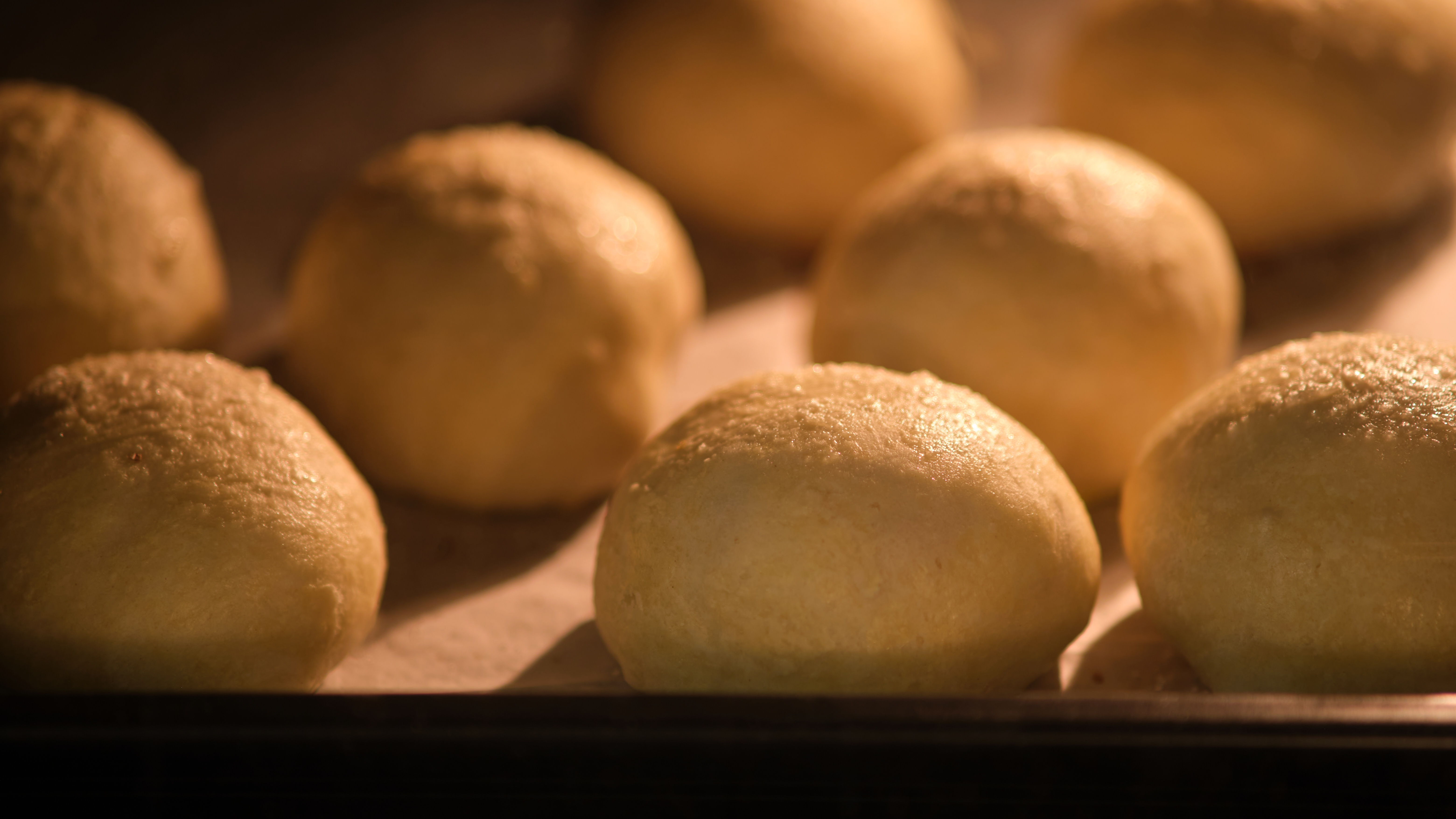 Bread rolls baking in an oven