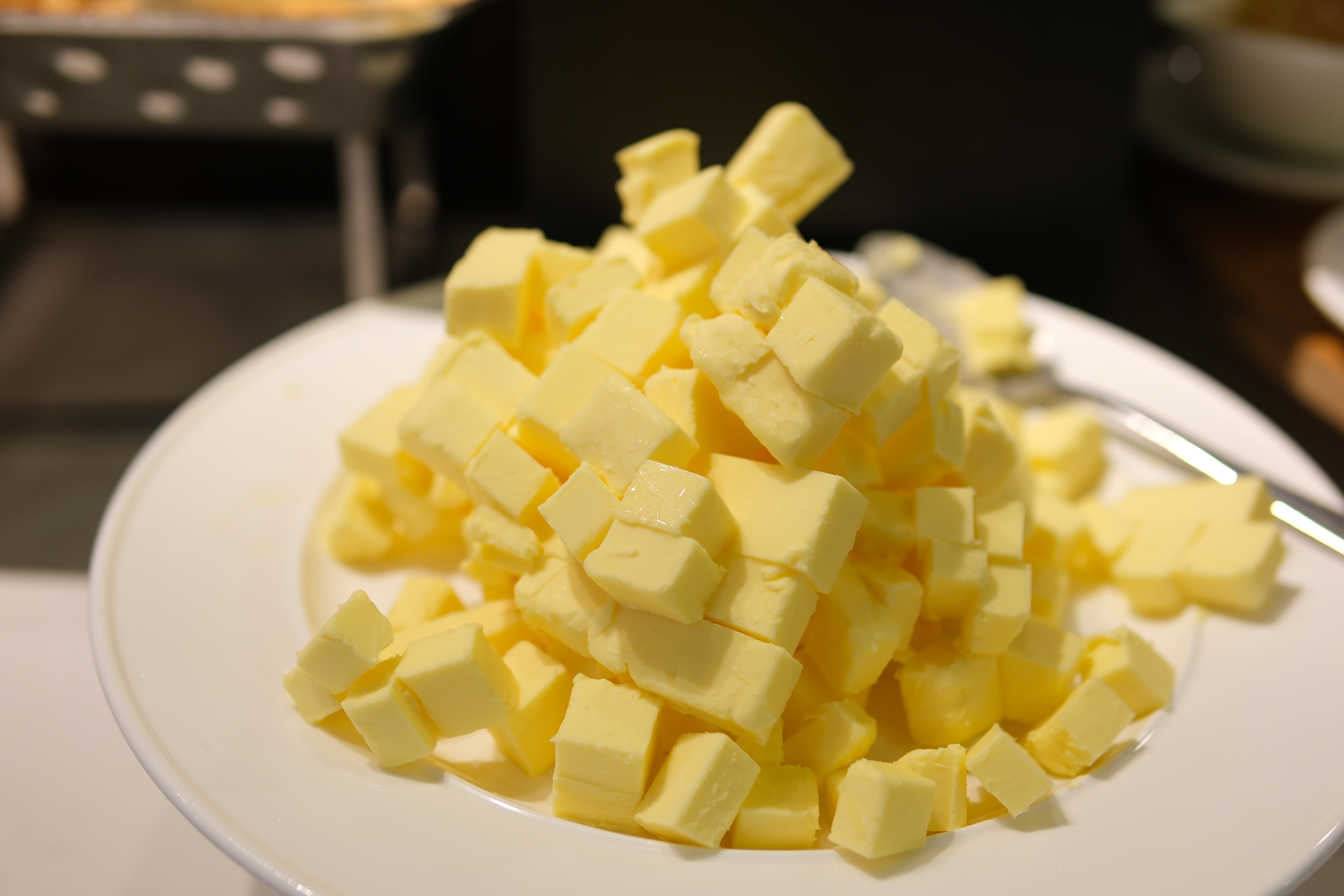A plate piled with cubes of butter