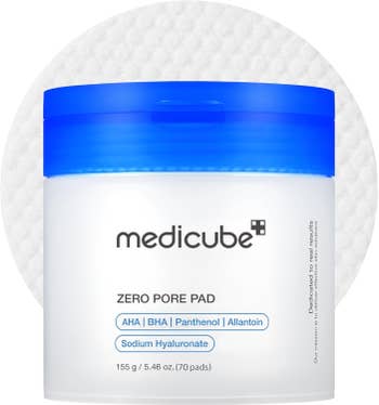 Container of Medicube Zero Pore Pad with labels for AHA, BHA, Panthenol, Allantoin, and Sodium Hyaluronate, on a white background