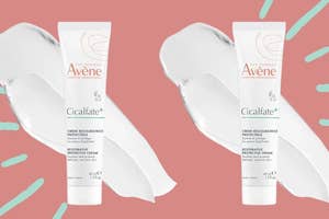 Two tubes of Avène Cicalfate+ Restorative Protective Cream displayed with cream texture strokes in the background