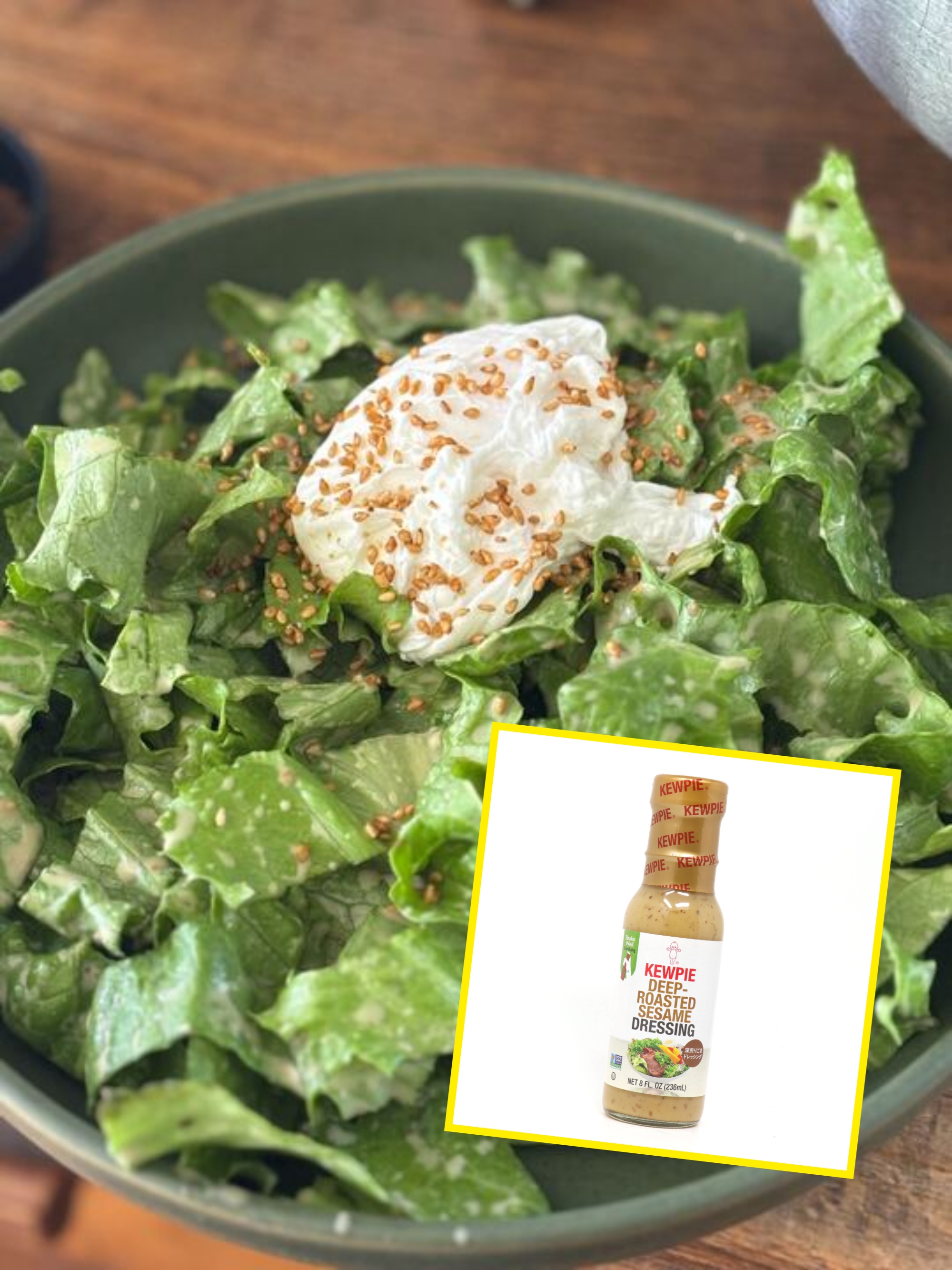 Fresh green salad with a dollop of creamy dressing and sprinkled sesame seeds